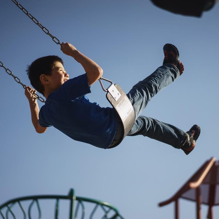 a boy on a swing